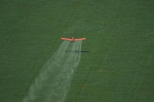 soya pesticides plane