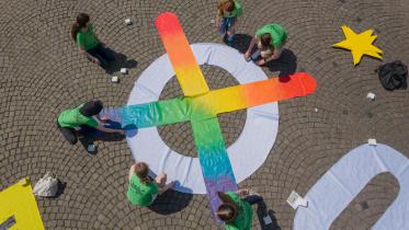 Youth Call to Vote at EU Elections with a Streetscape of Banners in Cologne
