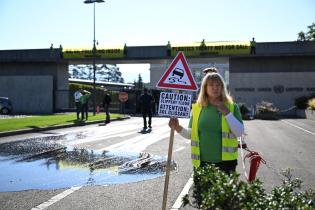 Greenpeace activists paint Geneva streets black to call out Big Oil’s chokehold on Global Plastic Treaty talks