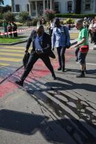Greenpeace activists paint Geneva streets black to call out Big Oil’s chokehold on Global Plastic Treaty talks