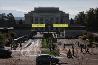 Greenpeace activists paint Geneva streets black to call out Big Oil’s chokehold on Global Plastic Treaty talks