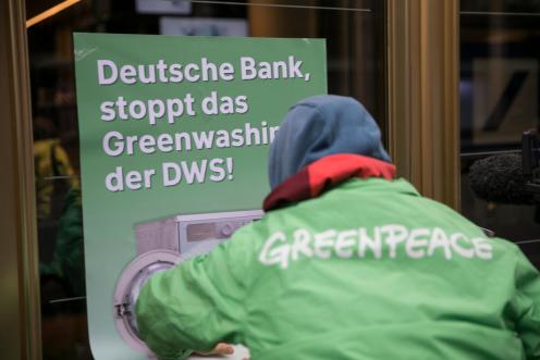 Greenpeace Activists Protest at Deutsche Bank Branch in Berlin
