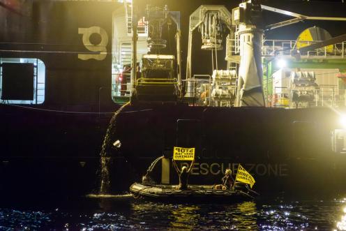 Night Protest with Climbers on Deep-sea Mining Ship in the Pacific Ocean