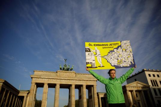 Protest for an Import Ban on Russian Oil at Brandenburg Gate in Berlin
