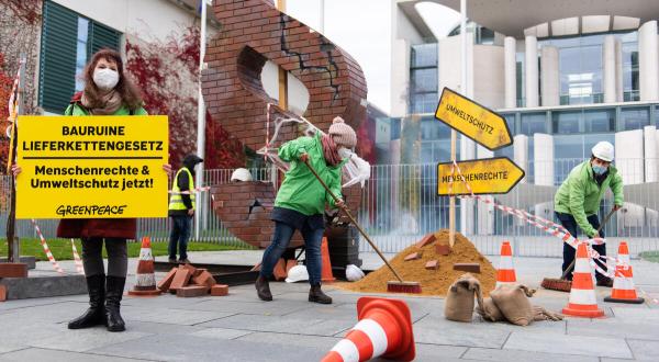Building Site Supply Chain Act in front of Federal Chancellery in Berlin