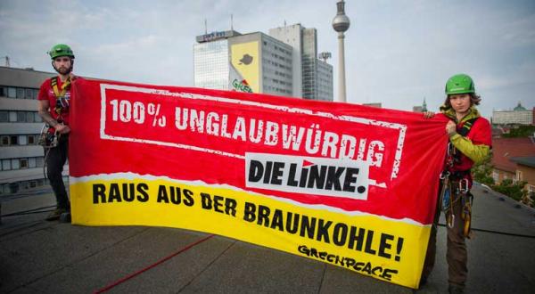 26.5.2014: Greenpeace-Aktivisten protestieren auch auf dem Dach der Linken-Zentrale in Berlin gegen deren widersprüchliche Kohlepolitik