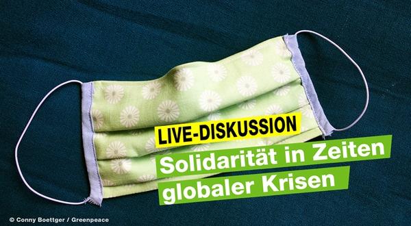 Selbstgenähte Mundschutzmaske mit Schriftzug der Veranstaltung