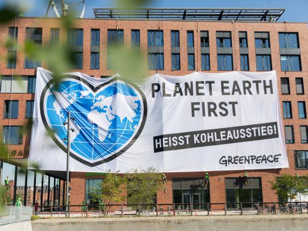"Planet Earth First" Banner at Greenpeace Office in Hamburg
